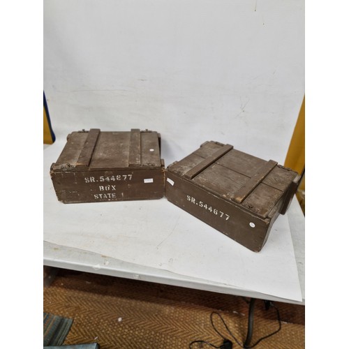 296A - TWO MID 20TH CENTURY PAINTED WOOD AMMUNITION BOXES WITH WHITE STENCIL LETTERING