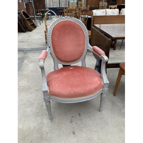 3045 - A FRENCH STYLE OVAL BACK PAINTED OPEN ARMCHAIR ON TURNED AND FLUTED LEGS