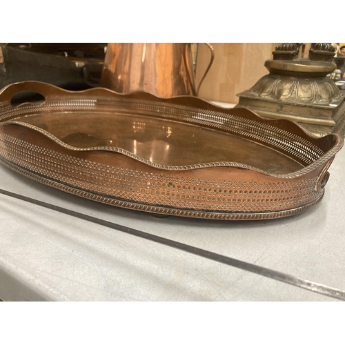 42 - A LATE VICTORIAN LARGE OVAL COPPER TRAY WITH GARDROONED RIM AND BUN FEET 52 X 34 CM