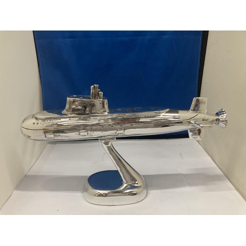 51 - A CHROME MODEL OF A SUBMARINE ON BASE