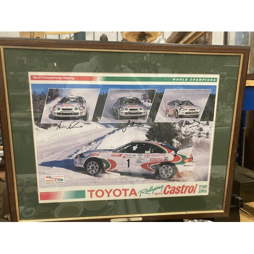 69 - A 'TOYOTA RALLYING WITH CASTROL' POSTER, WITH THREE SIGNATURES TO INCLUDE DIDIER AURIOL, JUHA KANKKU... 