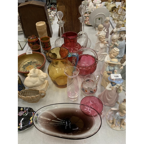 109 - A QUANTITY OF GLASSWARE TO INCLUDE CRANBERRY, JUGS, A BASKET BOWL, ART GLASS BOWL, DECANTERS, ETC