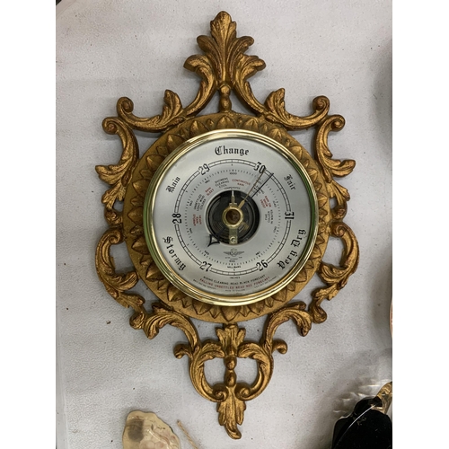 117 - A VINTAGE GILT BAROMETER