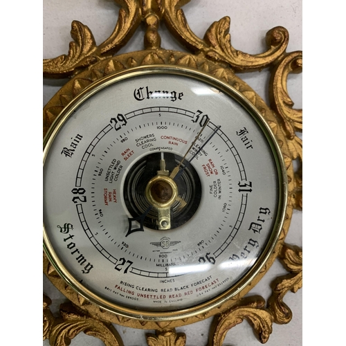 117 - A VINTAGE GILT BAROMETER