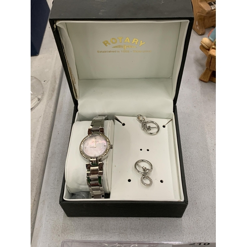 209 - A ROTARY LADIES WRISTWATCH WITH MOTHER OF PEARL FACE AND METAL STRAP, TOGETHER WITH A PAIR OF EARRIN... 