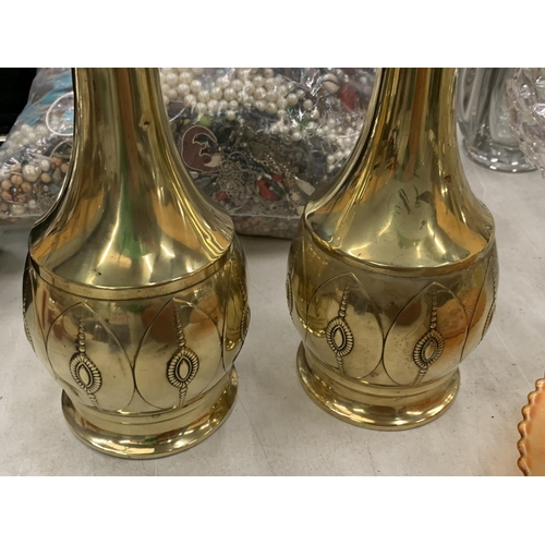 215 - A LARGE PAIR OF DUTCH BRASS VASES, HEIGHT 30CM