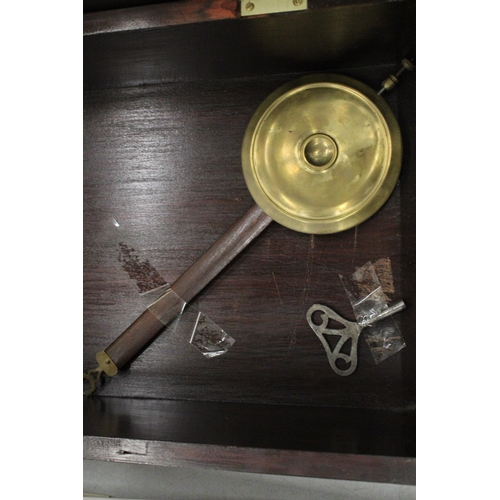 256 - A MAHOGANY CASED WALL CLOCK WITH PENDULUM AND KEY