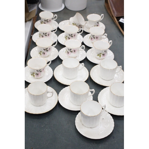 267 - A LARGE QUANTITY OF CHINA CUPS AND SAUCERS