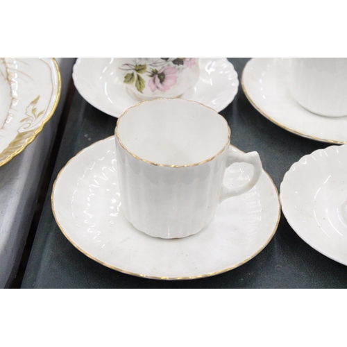 267 - A LARGE QUANTITY OF CHINA CUPS AND SAUCERS