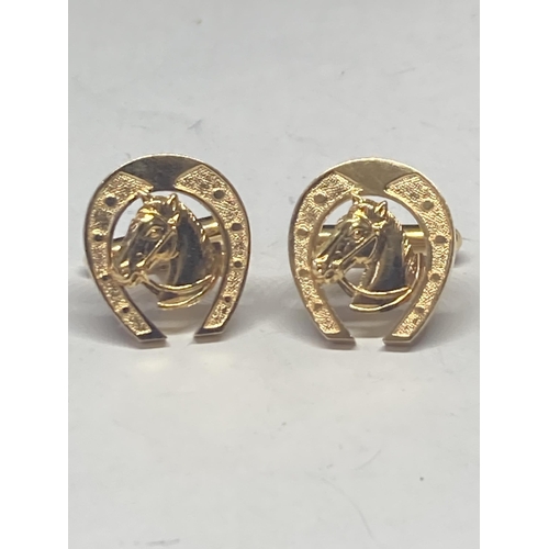 523 - A PAIR OF GOLDSMITHS MARKED 14 CARAT GOLD HORSESHEAD AND HORSE CUFFLINKS GROSS WEIGHT 9.5 GRAMS