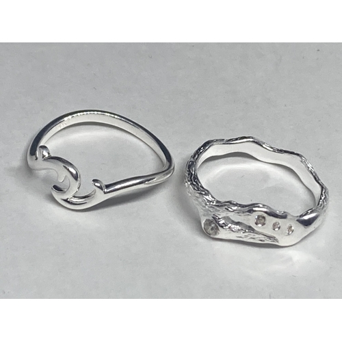 541 - FOUR VARIOUS SILVER RINGS