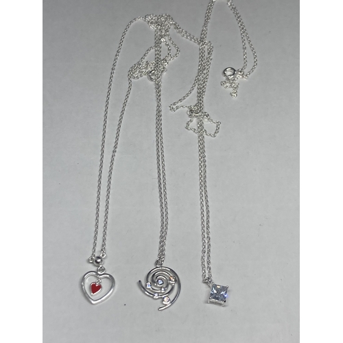 543 - THREE SILVER NECKLACES WITH PENDANTS