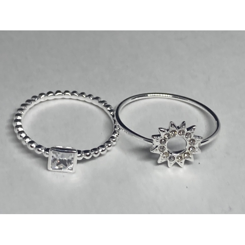 580 - FOUR VARIOUS SILVER RINGS