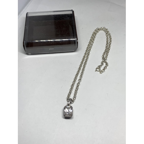 595 - A MARKED SILVER BELCHER CHAIN NECKLACE WITH A CLEAR STONE PENDANT IN A CASE