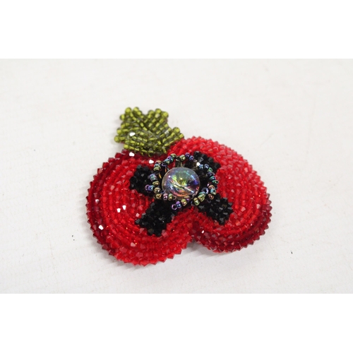 598A - A KLESHNA BEADED POPPY BROOCH IN ORIGINAL PRESENTATION BOX