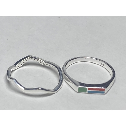 620 - FOUR VARIOUS SILVER RINGS