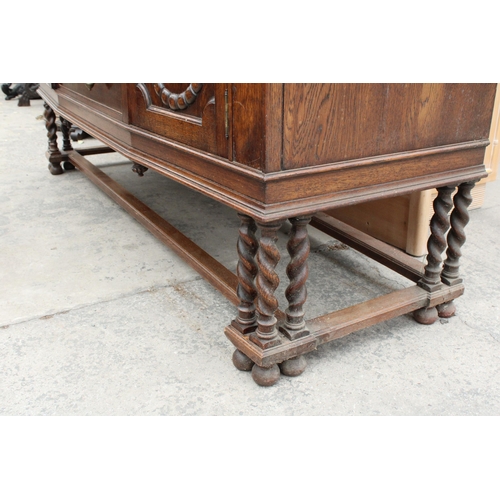 2842 - AN EARLY 20TH CENTURY OAK SIDEBOARD WITH RAISED BACK, TWO CUPBOARDS, TWO DRAWERS, THREE BARLEY-TWIST... 