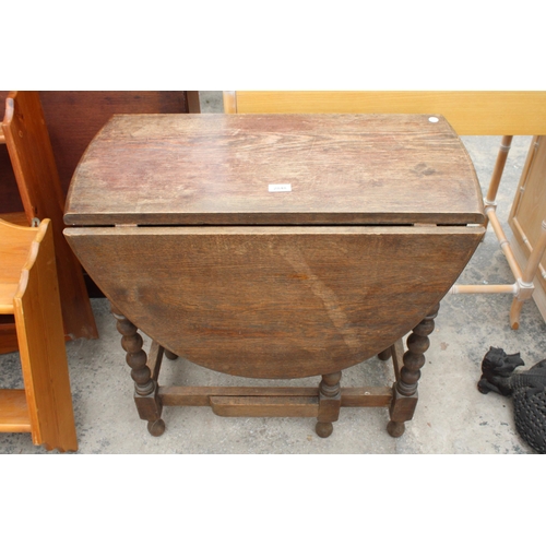 2848 - A MID 20TH CENTURY OAK GATE-LEG TABLE ON BOBBIN TURNED LEGS, 40.5