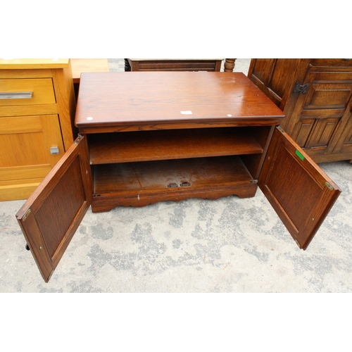 2854 - AN OAK GRANGEMOOR FURNITURE TWO DOOR CABINET/STAND