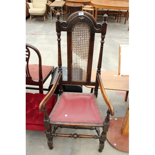 2891 - AN EARLY 20TH CENTURY OAK JACOBEAN STYLE ELBOW CHAIR AND A STOOL ON CABRIOLE LEGS