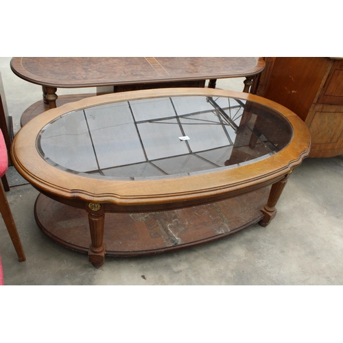 2903 - AN OVAL TWO TIER COFFEE TABLE WITH INSET GLASS TOP, 48