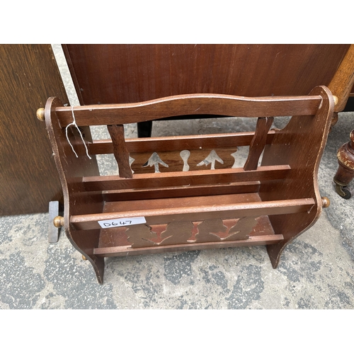 2933 - AN OAK FIRESCREEN, MAGAZINE RACK AND AN ASH TRAY STAND