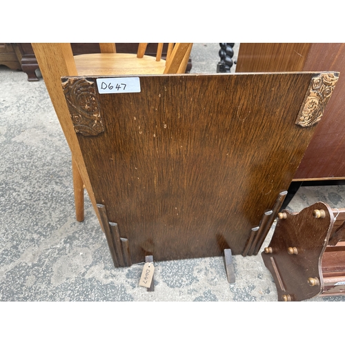 2933 - AN OAK FIRESCREEN, MAGAZINE RACK AND AN ASH TRAY STAND