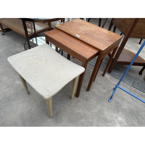 2943 - A RETRO TEAK NEST OF THREE TABLES AND A STOOL