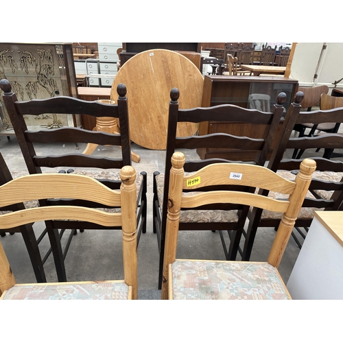 2945 - A SET OF FOUR PINE DINING CHAIRS WITH CURVED BACK RAILS