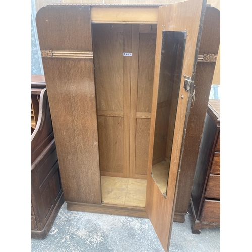 3004 - A MID 20TH CENTURY OAK WARDROBE, 47