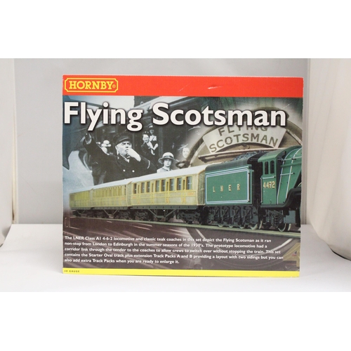 302 - A HORNBY OO GAUGE FLYING SCOTSMAN TRAIN SET TO INCLUDE LNER FLYING SCOTSMAN LOCOMOTIVE AND THREE COA... 