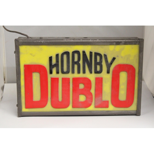 310 - A HORNBY DUBLO ILLUMINATED SIGN, 43CM X 27CM