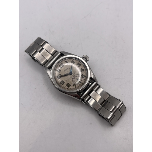 606 - A GENTLEMAN'S EARLY ROLEX OYSTER STAINLESS STEEL WRISTWATCH - DIAMETER 33 MM INCLUDING CROWN WINDER