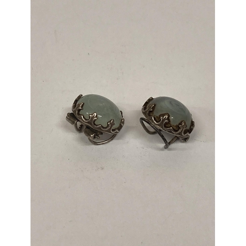 689 - A PAIR OF VINTAGE BLUE GLASS CABACHON CLIP ON EARRINGS (POSSIBLY SILVER)