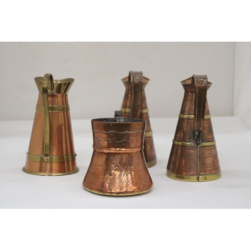 117 - FOUR VINTAGE BRASS AND COPPER JUGS