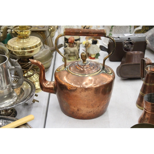 121 - TWO VINTAGE COPPER KETTLES