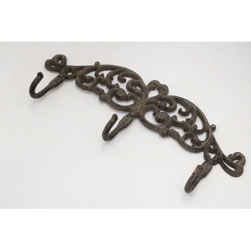 138 - A VICTORIAN CAST IRON, RUSTIC WALL COAT HOOK