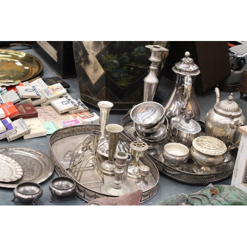 144 - A LARGE QUANTITY OF SILVER PLATE TO INCLUDE GALLERIED TRAYS, A COFFEE POT, TEAPOT, SUGAR BOWL, BUD V... 