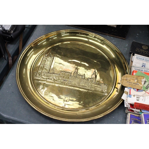 148 - A LARGE BRASS HOUSES OF PARLIAMENT WALL PLAQUE, DIAMETER 41CM