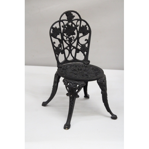 159 - A VINTAGE BLACK CAST IRON APPRENTICE PIECE CHAIR, HEIGHT 35CM