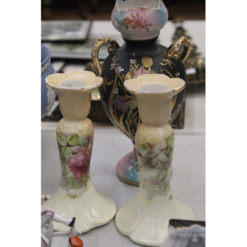 175 - TWO GERMAN FAIRINGS TOGETHER WITH A PAIR OF FLORAL VINTAGE CERAMIC CANDLE HOLDERS AND A PORCELAIN VA... 