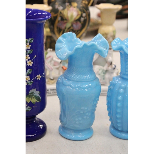 176 - TWO BLUE OPALINE MILK GLASS VASES TOGETHER WITH TWO FURTHER DECORATIVE COBALT BLUE AND FLORAL GLASS ... 