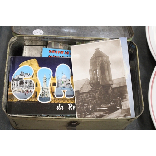 196 - A COLLECTION OF VINTAGE POSTCARDS TO INCLUDE EDWARDIAN, IN A VINTAGE TIN