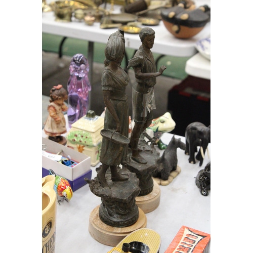 200 - TWO VINTAGE METAL FIGURES OF FARMERS ON LATER WOODEN PLINTHS, HEIGHT APPROX 36CM