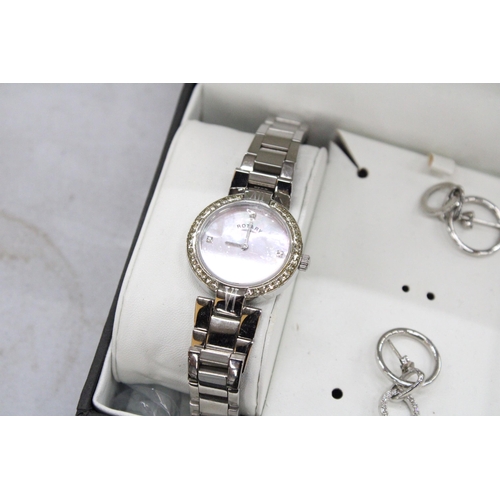 202 - A ROTARY LADIES WRISTWATCH WITH MOTHER OF PEARL FACE AND METAL STRAP, TOGETHER WITH A PAIR OF EARRIN... 