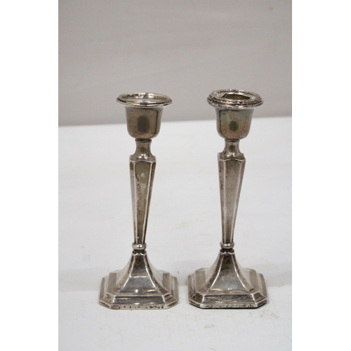 3 - A PAIR OF HALLMARKED CHESTER SILVER CANDLESTICKS WITH WEIGHTED BASES GROSS WEIGHT 155.6 GRAMS