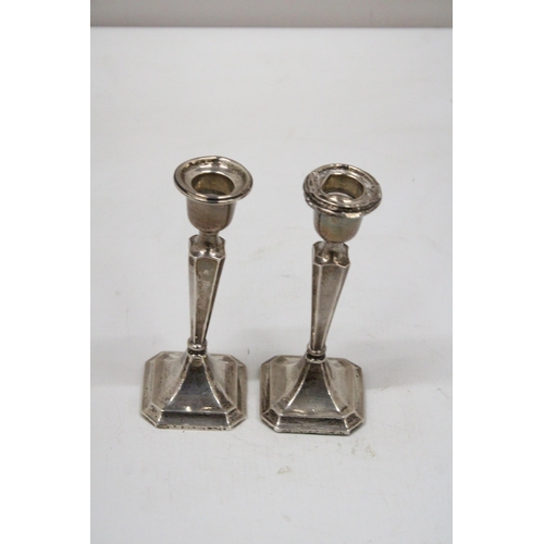 3 - A PAIR OF HALLMARKED CHESTER SILVER CANDLESTICKS WITH WEIGHTED BASES GROSS WEIGHT 155.6 GRAMS