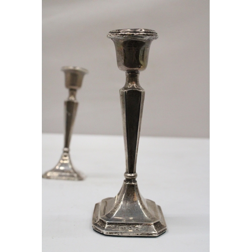 3 - A PAIR OF HALLMARKED CHESTER SILVER CANDLESTICKS WITH WEIGHTED BASES GROSS WEIGHT 155.6 GRAMS