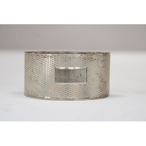 5 - A HALLMARKED BIRMINGHAM SILVER SEMI CIRCULAR NAPKIN RING GROSS WEIGHT 30.6 GRAMS (ENGRAVED)