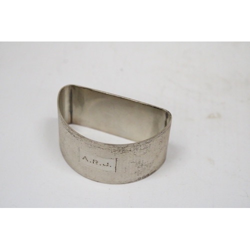 5 - A HALLMARKED BIRMINGHAM SILVER SEMI CIRCULAR NAPKIN RING GROSS WEIGHT 30.6 GRAMS (ENGRAVED)